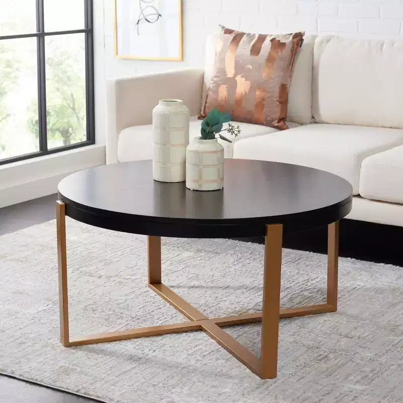 Navya Round Coffee Table - Safavieh