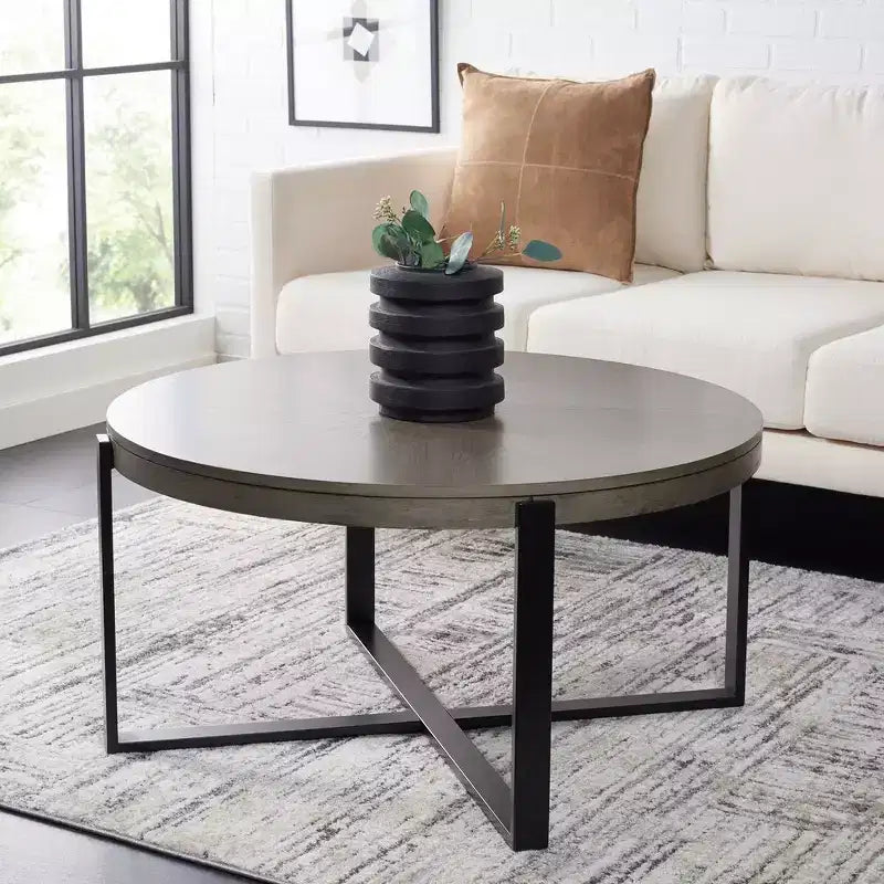 Navya Round Coffee Table - Safavieh